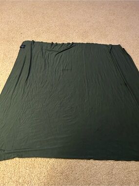 Baby swaddle by Milkmaid Goods.  For newborns.